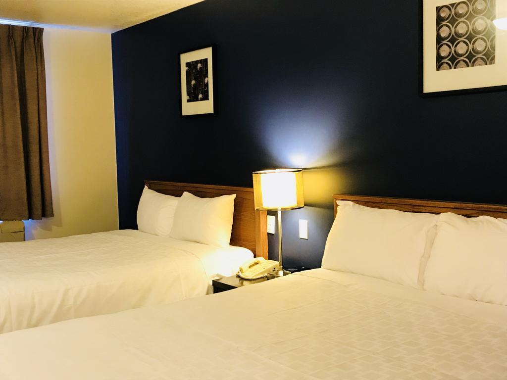 Empire Inn & Suites Penhold Buitenkant foto