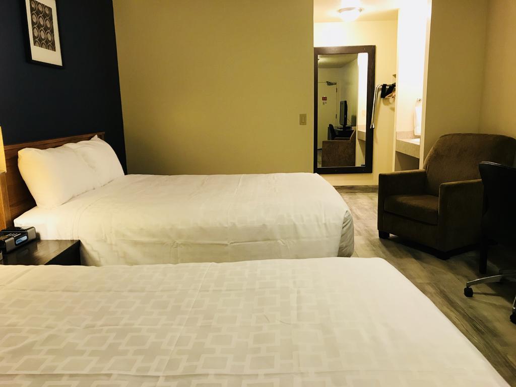 Empire Inn & Suites Penhold Buitenkant foto