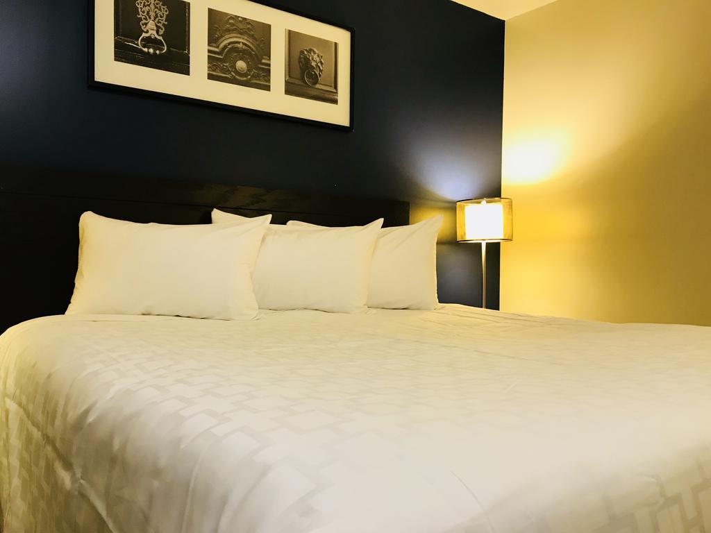 Empire Inn & Suites Penhold Buitenkant foto